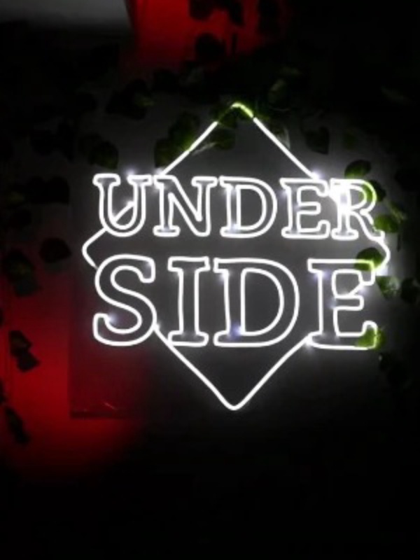 Logo de Underside en neón